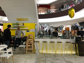 Cafe Tomeli's interior on a shopping center floor  Project image
