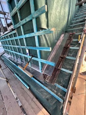 Tiled roof installation. Flat roof installation.  Project image