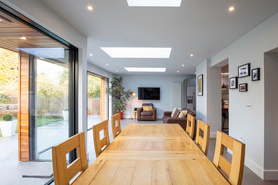 Modern kitchen, dining and family room extension with spacious patio.  Project image