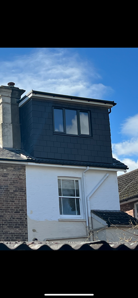 Tiled roof installation. Flat roof installation.  Project image