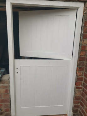 Barn door for garage with acoustic/storm-proof seals to all rebates and door joint Project image