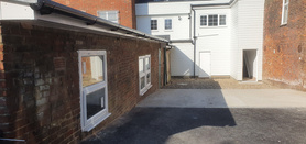 Conversion of derelect shop to shop with parking and 2 x 2 bed apartments  Project image