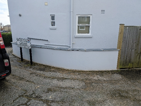 Blockwork Extension with Lead Tray Installation and Curved Brick Feature Wall Project image