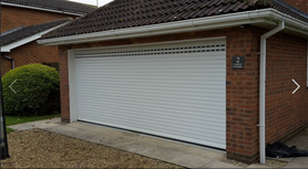 2 garage doors into 1. Project image