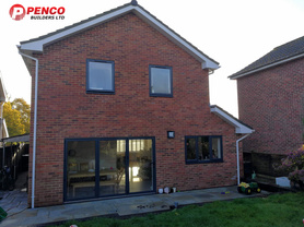 Double storey rear extension, internal re-design and front of the house re-profiling.  Project image