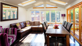 Back Sunroom with velux windows, bi-fold doors. Project image