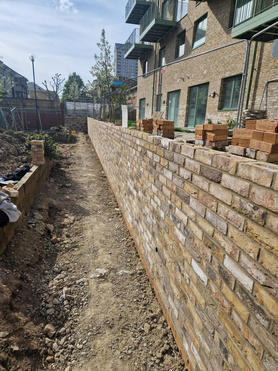 Complete rebuild of old failed retaining wall. Project image