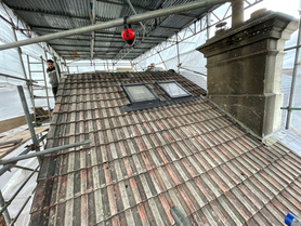 Tiled roof installation. Flat roof installation.  Project image