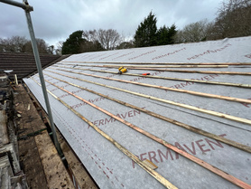 Interlocking tile roof installation. Solar panel installation.  Project image