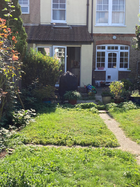 Landscaping inc' raised patio area patio are  Project image