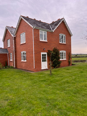 Two storey extension and patio with water fountain Project image