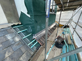 Tiled roof installation. Flat roof installation.  Project image