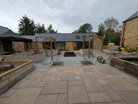 Courtyard Renovation with Pergolas, Raised Planters & Corten Steel Water Feature Project image