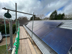 Interlocking tile roof installation. Solar panel installation.  Project image