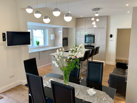 Complete refurbishment of a large family home in Purley after a flood. Project image