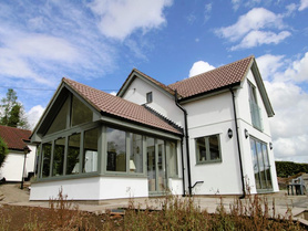 Large sunroom and two-storey side extension Project image