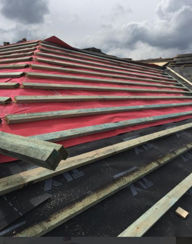 Completed new truss roof & full installation of a flat roof Project image