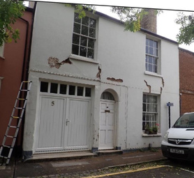 RETROFIT CASE STUDY : Cork/ Lime insulating render ( Diathonite) applied External Render to a tradition Coach house in a Conservation Area Project image