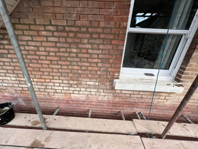 Repointing brickwork.  Project image