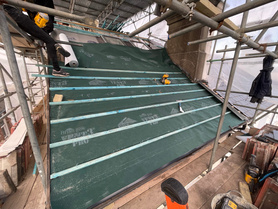 Tiled roof installation. Flat roof installation.  Project image