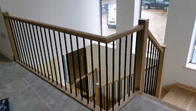 oak banister with black iron rail spindles  Project image