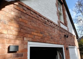 Detached double garage with accommodation above for use as a gym Project image