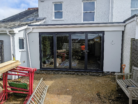 Blockwork Extension with Lead Tray Installation and Curved Brick Feature Wall Project image