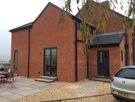 Bramham.   2 story Kitchen /Living. Master bedroom and en-suite with remodelling and double garage. Project image