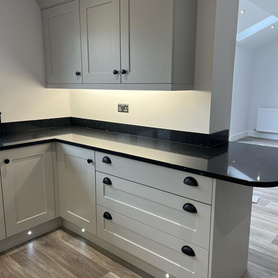 Stunning Kitchen - it’s been a while since anyone’s had black worktops as white is all the rage but these def stand out with the black handles  Project image