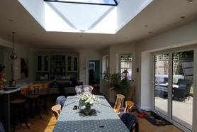 Rear and wrap around extension along with landscaping and stone driveway.  Project image