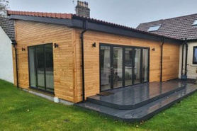 Single Storey rear full extension from groundworks to tiling - kitchen fitting - flooring - electrics - painting and decorating - decking and much more Project image