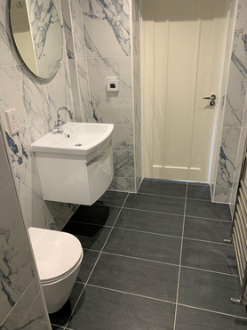 Reconfiguration, installation of wet room and bespoke built in units   Project image