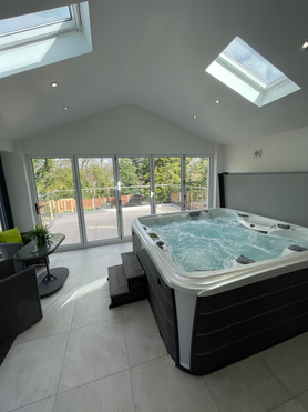 Single story hot tub extension, Porcelain patio & Landscaping Project image