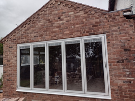 Brick built extention with tiled roof at side of property Project image