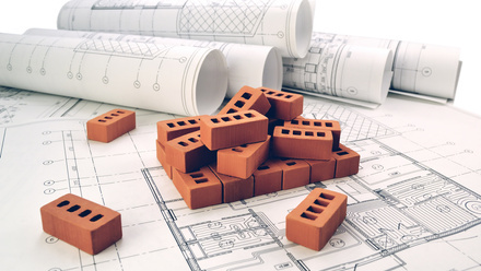 iStock Planning bricks and blueprints.jpg