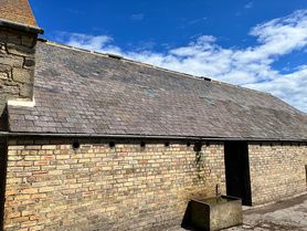 Traditional Slate Roof On Old Farm Buildings.  Project image