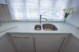 Kitchen Gloss White with Corian Worktop Project image