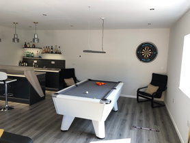 A double garage with games room  Project image