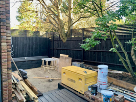 Rear Garden patio with black stained fences. Patio slabs ready to be laid! Project image