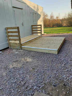 Ramp and step construction on a mobile unit Project image