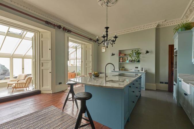 Blue kitchen by Carreg Construction Ltd