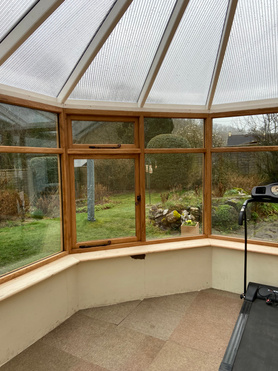 Conservatory replacement roof with new Oak doors and windows. Project image
