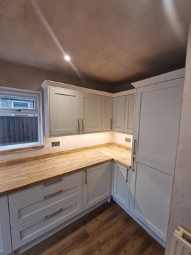 Beautiful shaker style kitchen and classic oak worktops  Project image