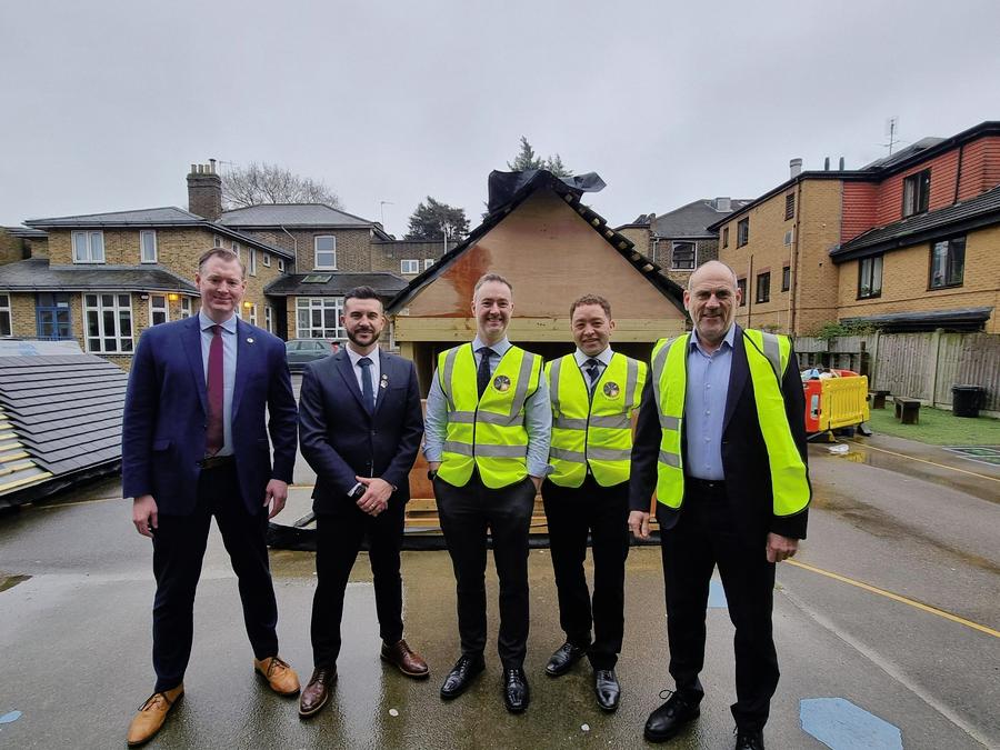 Build academy learners present findings from their training course to boardroom