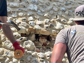 Repairing & repointing a flint wall to prepare for a small extension build Project image