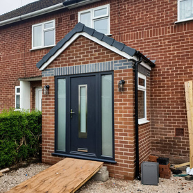 Anthracite grey front door with the smoked glass!!!! Really finishes of this porch extension. Project image
