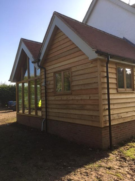 Double Gabled Extension with Solid Oak Work and Larch Cladding Project image