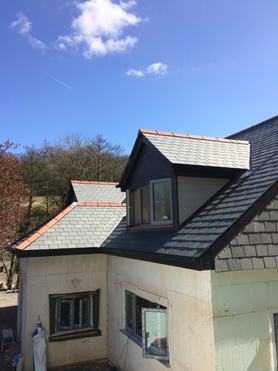 Bespoke hand cut roof Project image