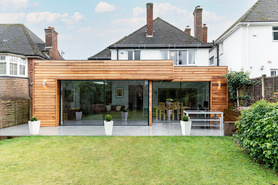 Modern kitchen, dining and family room extension with spacious patio.  Project image