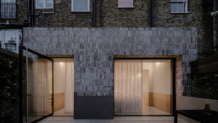 2025 MBAs - Clonmoran Building & Carpentry Limited - exterior finish extension tiles night.jpg